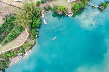 Aerial landscape in Quay Son river, Trung Khanh, Cao Bang, Vietnam with nature, green rice fields and rustic indigenous houses.