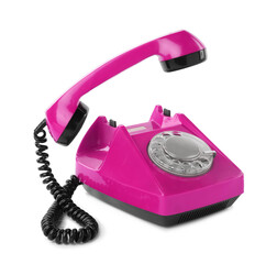 Old magenta color telephone with rotary dial isolated on white