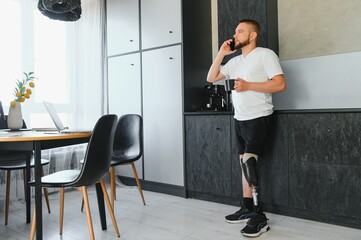 Man amputee with prosthetic leg disability on above knee transfemoral leg prosthesis artificial...