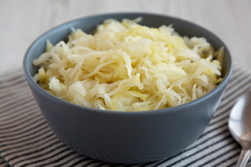 Homemade German Sauerkraut in a Bowl, side view.