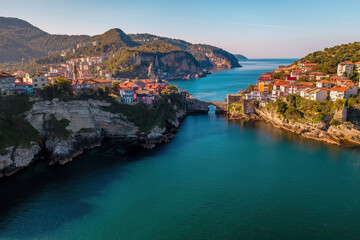 Magnificent town view in Amasra. Islands on the sparkling sea are connected by a bridge. Magnificent aerial shot with drone. Amasra, Turkey.