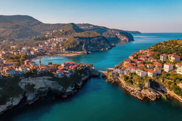 Magnificent town view in Amasra. Islands on the sparkling sea are connected by a bridge. Magnificent aerial shot with drone. Amasra, Turkey.