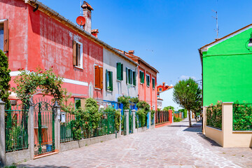 June 25, 2019. Italy. Burano. Italy, has a charming alleyway with colorful elements and unique architecture