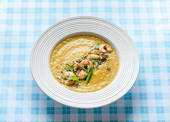 pumpkin soup with shrimp and pumpkin seeds