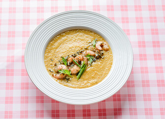pumpkin soup with shrimp and pumpkin seeds