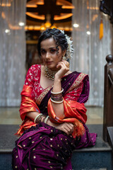 Cultural Radiance: A Marathi Woman in Festive Nauvari Saree and Jewelry