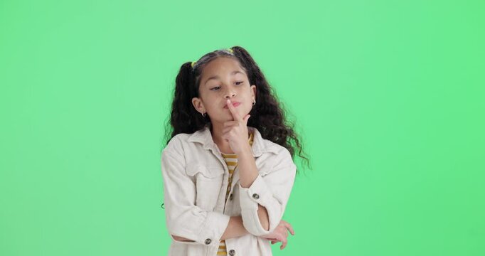 Child, girl and question or thinking on green screen with confused face for education, solution or learning. Student or kid in doubt, remember or process information with memory on studio background