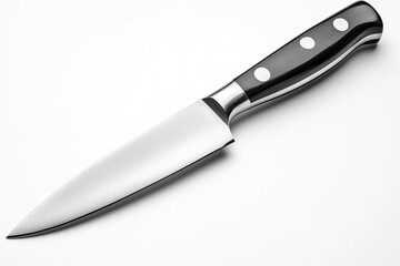 Fototapeta premium Elegant European kitchen chef knife glimmers on a pristine white background