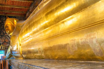 Wat Pho temple. Golden Big Buddha statue, Bangkok city, Thailand, Asia. Temple of the Reclining...