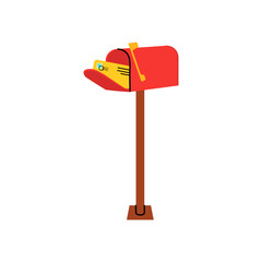 A red mailbox ready to receive letters standing on a wooden post in a sunny neighborhood setting