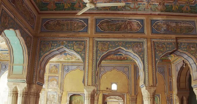 Old-painted Walls. Frescoes On Wall Of Hanuman Temple In Jaipur, India. Religious Motifs From Life Of Hanuman Are Painted. Monkey-like Deity, Son Of Wind God Vayu. Hanuman Also Known As Maruti