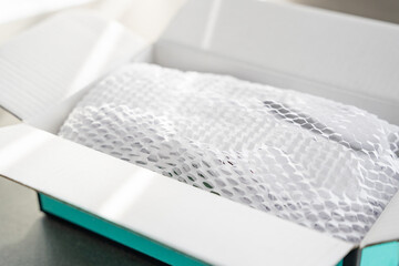 Corrugated white paper for safe transportation, in which the goods brought by the courier delivery...