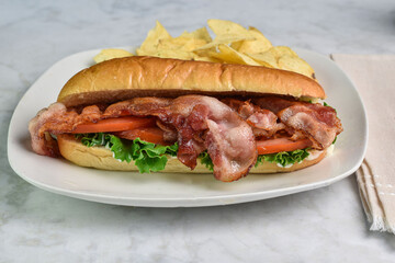  blt sub served with  potato chips