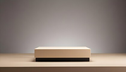 A simple white rectangular platform or pedestal on a wooden surface against a plain background