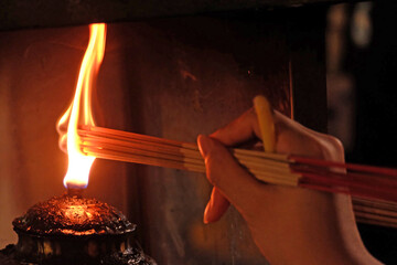burning incense in the fireplace