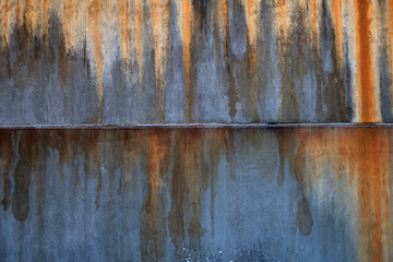 Concrete wall with rust