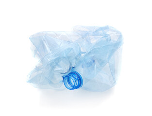 Flattened used plastic bottle.