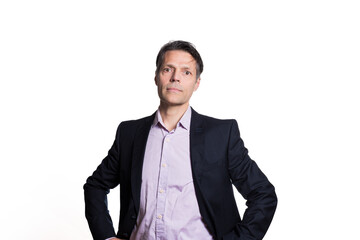 Fototapeta premium Middle-aged man looking at the camera, on white background, wearing formal clothes.