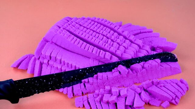 Very Satisfying and Relaxing Kinetic Sand ASMR video. Cutting anti stress macro close up colorful Kinetic Sand with a Knife. ASMR sounds.