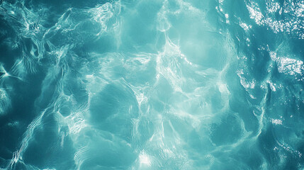 Fototapeta premium Crystal Clear Water Texture. Light Blue Ripples and Splashes in Sunlight. Abstract Blue Wallpaper.