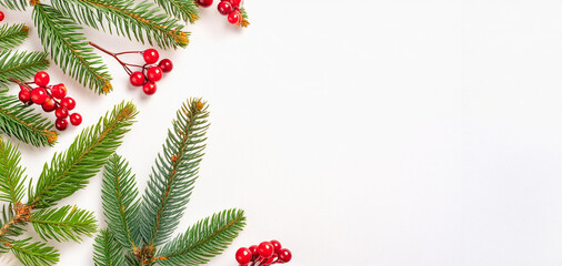 Flat lay grey table top view over with Christmas holiday ornament decoration with copy space, gift box with pine cones and fir branches. Christmas and New Year background