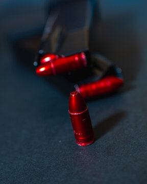 red 9mm bullets and magazines