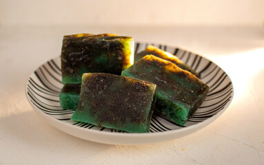 A Collection of Handmade Green and Brown Soap Bars