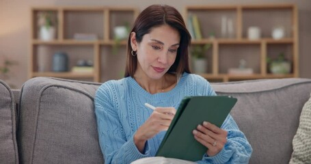 Mature woman, sofa and scroll with tablet for online gaming, entertainment or relax on weekend. Female person, happy and rest on technology on mobile app, streaming service and social network in home