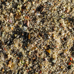 Seamless texture a sand surface with small stones perfect for rendering surfaces.
