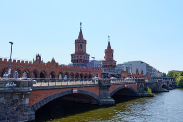 Fototapeta premium Berlin (Germany) - August: Oberbaum bridge historical architecture