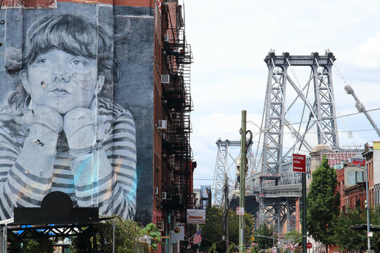 Williamsburg, Brooklyn, NYC, USA - August the 17th of 2022: Detail of  "Mona Lisa of Williamsburg", one of the most famous urban art creations in NYC. It is inspired in a Steven Paul's iconic picture.