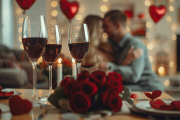 Happy young couple celebrating anniversary or valentines day with wine, red roses and heart shaped balloons. High quality photo