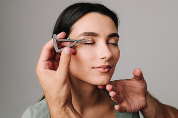 Castroviejo caliper to draw symmetrical contour for eyelid surgery. Blepharoplasty marking up....