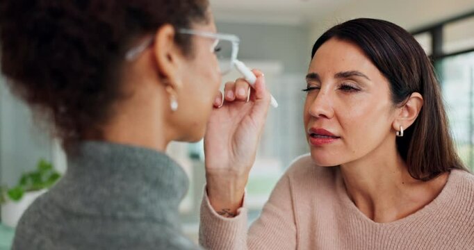 Women, optometry and eye test for glasses with specialist, consultation and medical professional. Female people, spectacles and optometrist in clinic or ophthalmology center for size, frame and lens