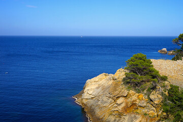 rocky coastline of the Mediterranean Sea, near Aiguafreda, Begur, seen from the Camí de Ronda hiking trail, Costa Brava, Catalonia, Girona, Spain