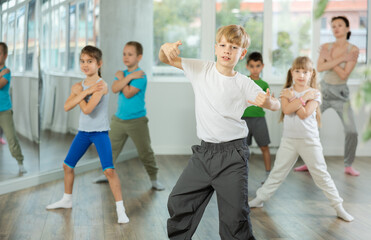 Fototapeta premium Group of children boys and girls dance hip hop in studio