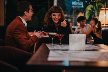 A joyful group of friends sharing laughter and drinks in a trendy bar. Highlighting friendship,...