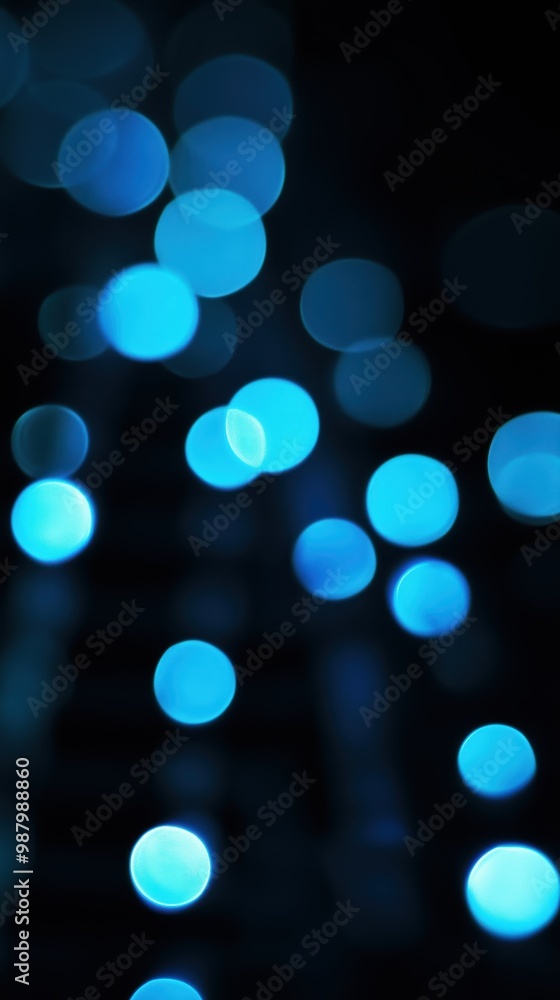 Aufkleber abstract blue bokeh lights against a dark background creating a dreamy and ethereal atmosphere.