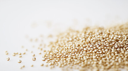 quinoa: a loose frame made from quinoa grains, scattered lightly over a white background, the small, round grains create a subtle, textured look