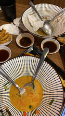 used dinner plates on table close up view of asian food
