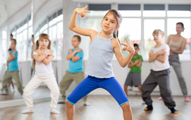 Fototapeta premium Group of children boys and girls dance hip hop in studio