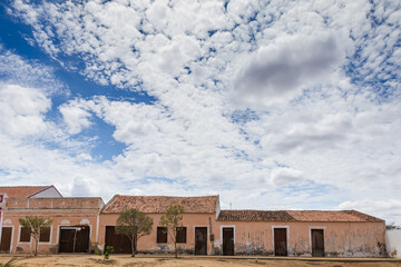 Typical colorful houses in the Brazilian countryside contrast with the dry climate of the backlands in the city of Taperoá, state of Paraíba. Brazil, a tropical country.