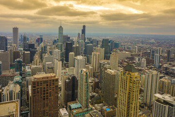 Golden Cityscape.
The sprawling beauty of a modern metropolis, basked in golden hues under a dramatic sky.
