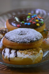 donuts on glass tray, donuts for sale