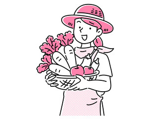 野菜を収穫して喜ぶ麦わら帽子とエプロンを身に着けた若い女性