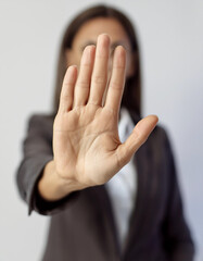 Obraz premium Stop harassment violence in workplace concept. Boss or employer sexually harassed a business woman at work. Depressed girl sitting in office. stop violence against Women, international women's day.