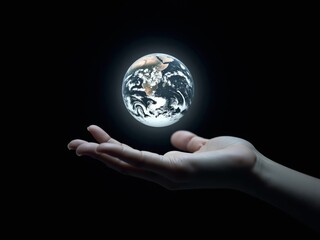 A Person Holding a World Globe Hologram In His Hands. isolated on black background.