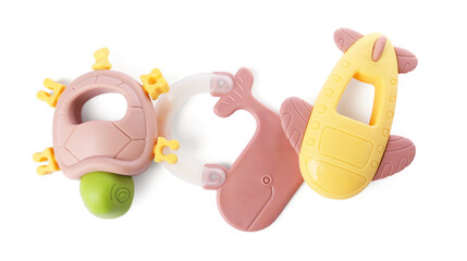 Colorful rattles isolated on white, top view. Baby accessories