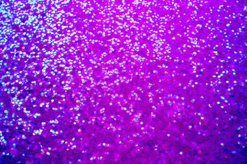 Shiny violet and blue glitter. Halloween background