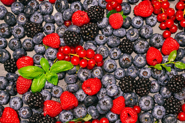 Mix of different berries. Berries fruits background. Wild berries patern. Mix of garden berries.
